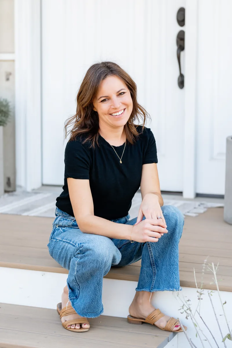 Sarah Feeley seated on her porch